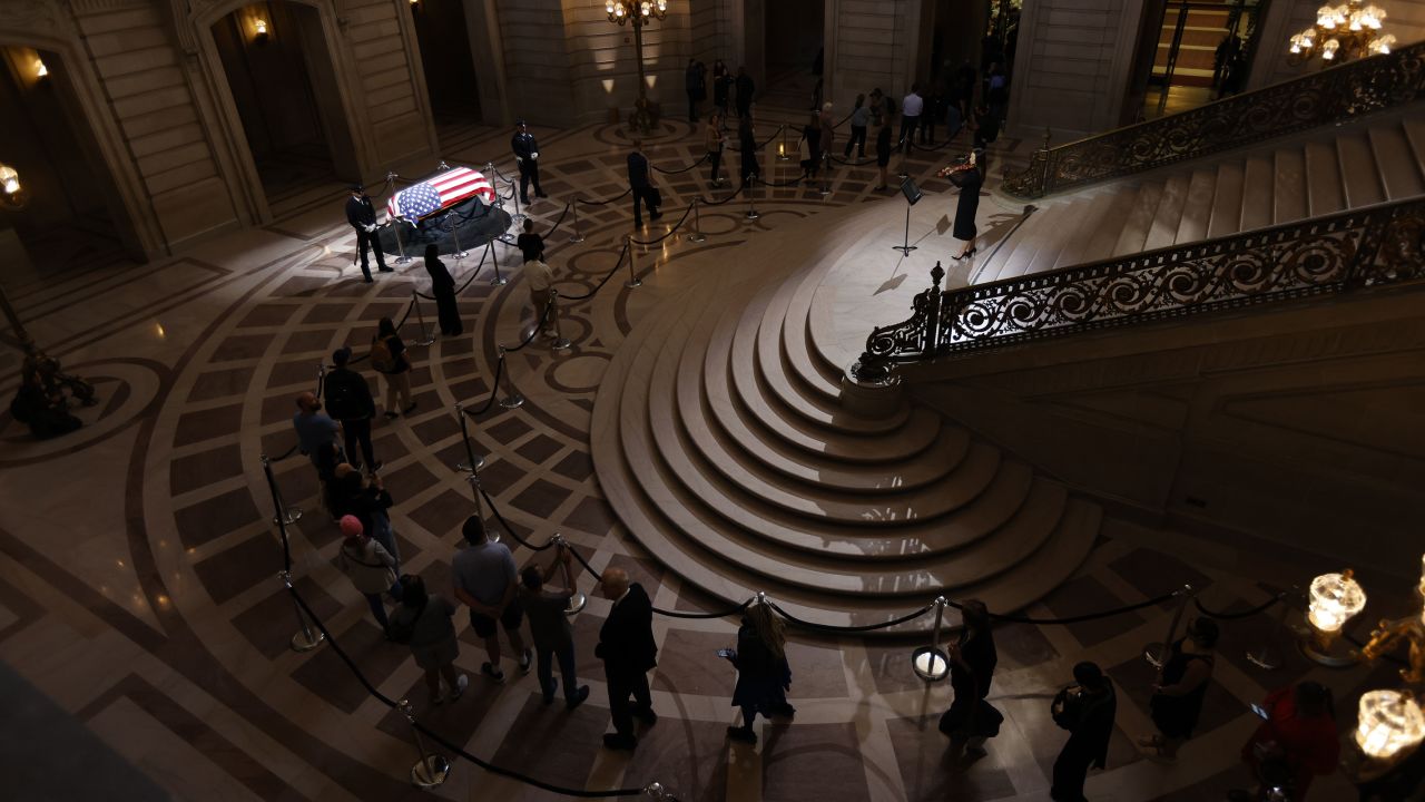 People line up at San Francisco City Hall to pay their respects to the late senator. 